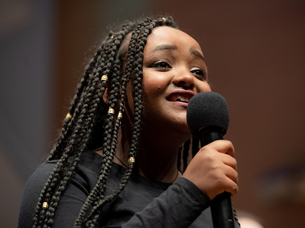 African American young woman singing