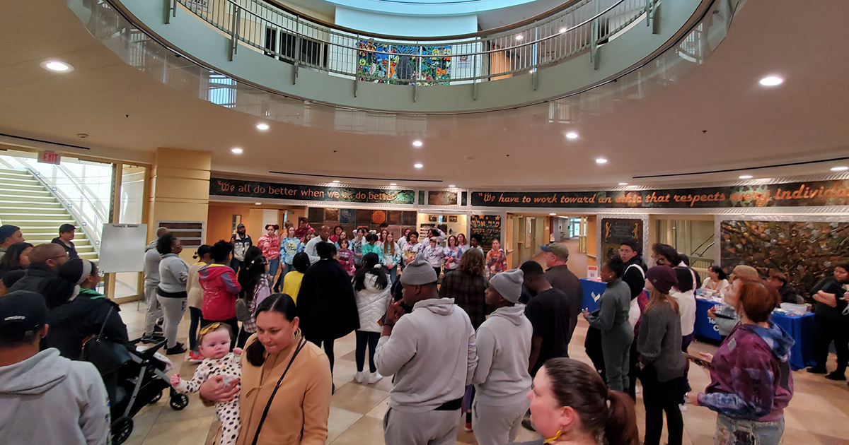 Image of people attending an event. Photo credit: Robert Graham